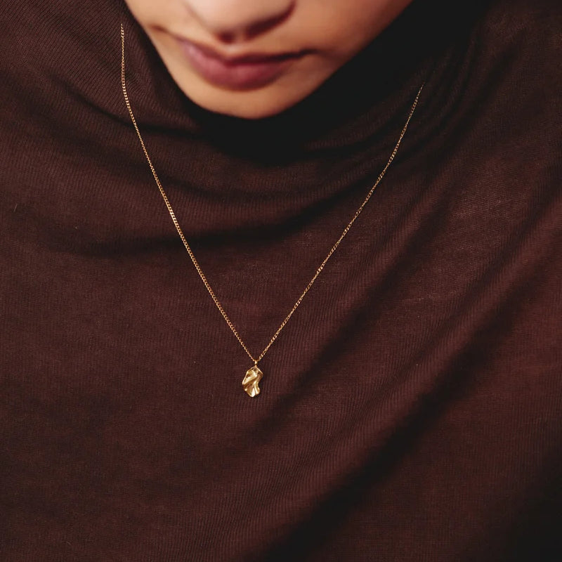 1251_c3f8df416b-edblad-melted-necklace-gold-cu-131813-full.webp