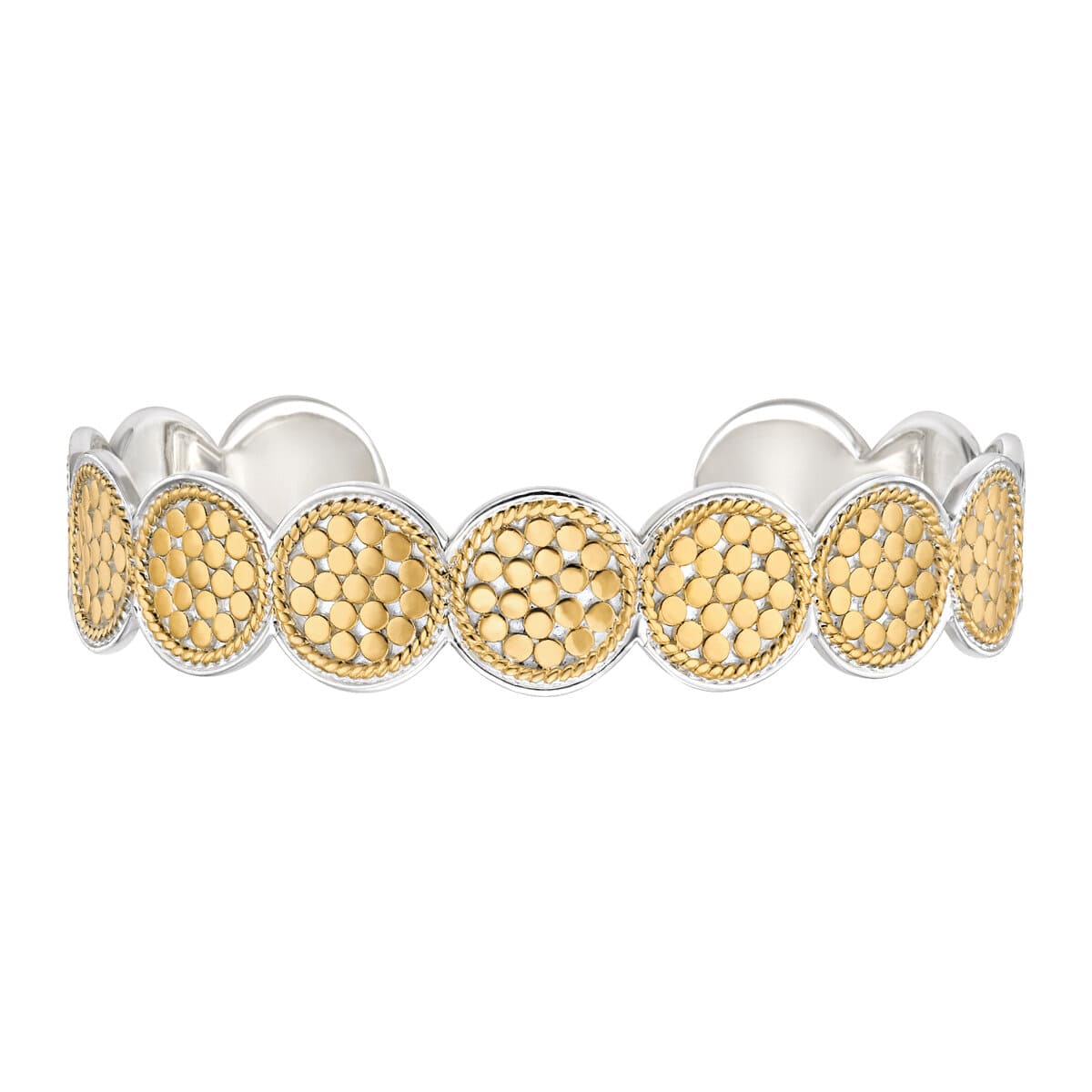 Gold and silver bracelet on a white background