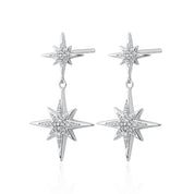 Scream Pretty | Hannah Martin Art Deco Star Earrings A pair of sterling silver art deco star drop stud earrings with multiple points, reflecting light and showcasing a geometric pattern.