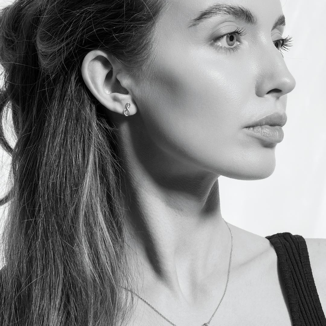 Infinity_Mini_Stud_Earrings_on_model.jpg