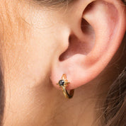 Scream Pretty | Large Black Star Huggie Earrings