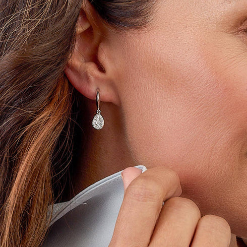 Model_wears_Coast_Pebble_Glisten_Pav_Hoop_Earrings_1_27cc9908-c660-4168-b25c-30cfb9905f2a.jpg