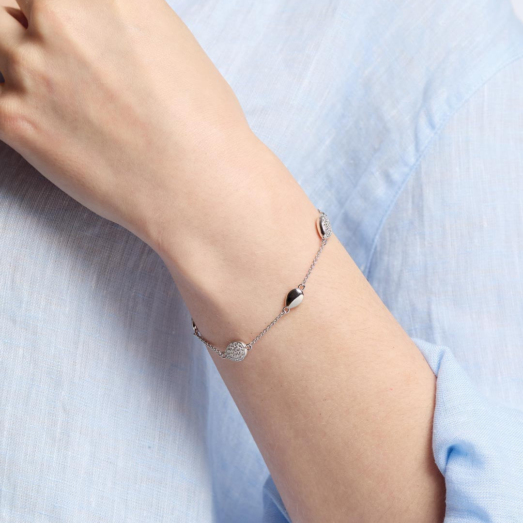 Model_wears_Coast_Pebble_Glisten_Pav_Station_Bracelet_1.jpg