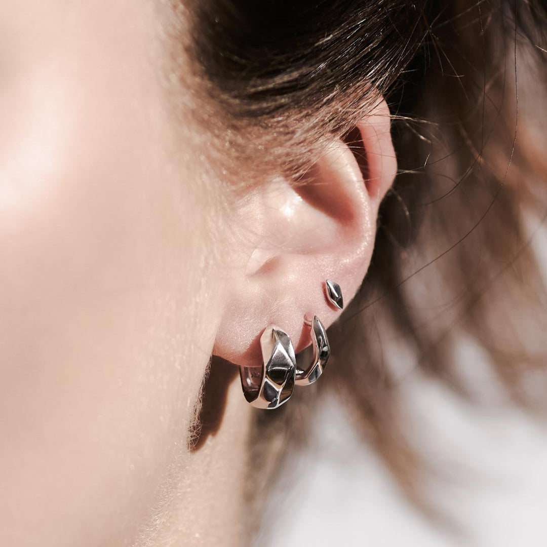 Model_wears_Glint_Geo_Wide_Hoop_Earrings_2.jpg