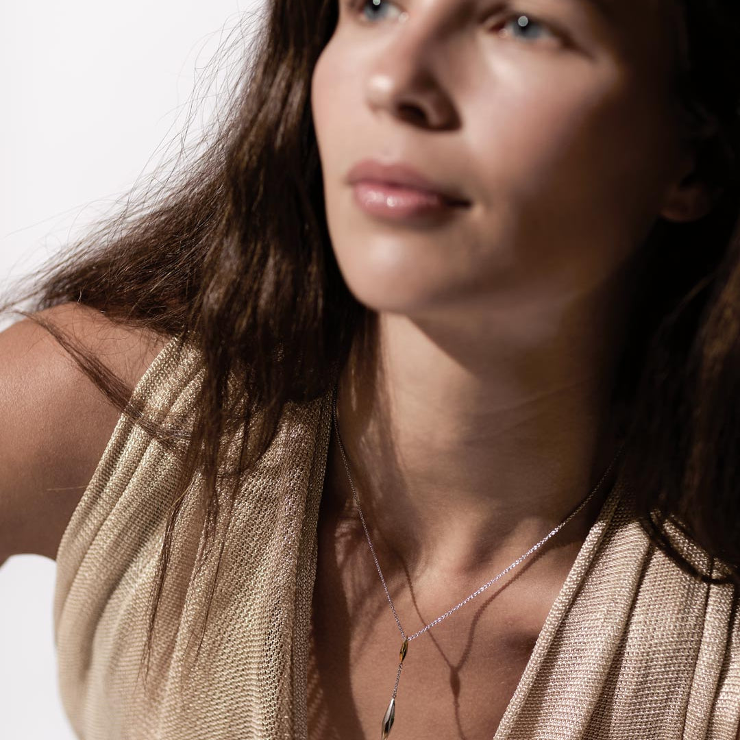 Model_wears_Glint_Lariat-Style_Necklace.jpg