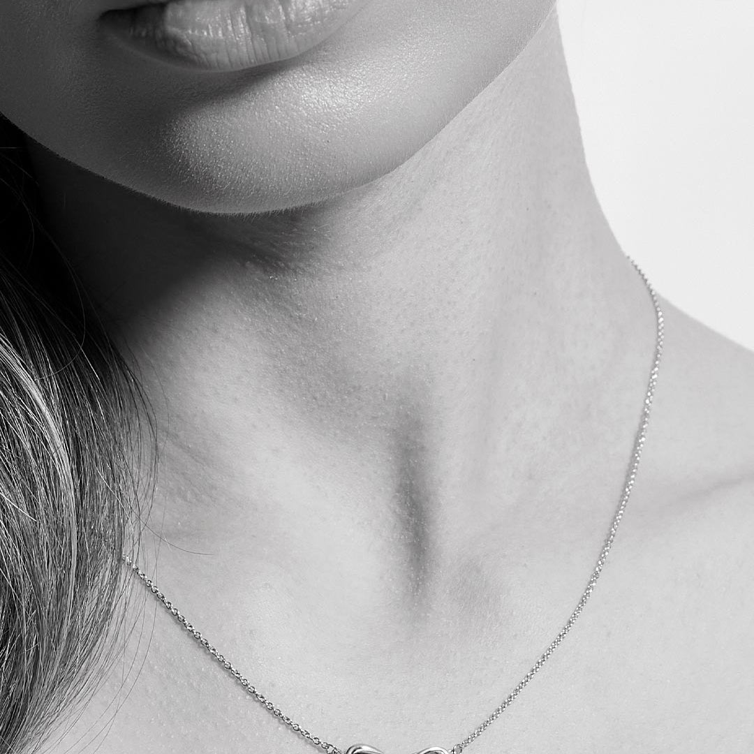Model_wears_Infinity_Mini_Necklet.jpg
