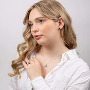 Penmans |  9ct White Gold Blue Topaz stud Earrings