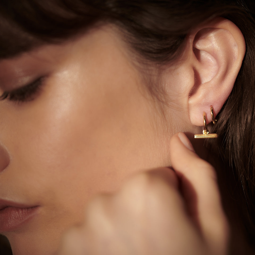 Rachel Jackson |  Mini T-Bar 22ct Gold Plated Huggie Hoop Earrings