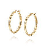 Daisy London |  ESTÉE LALONDE GODDESS GLOW HOOP EARRINGS